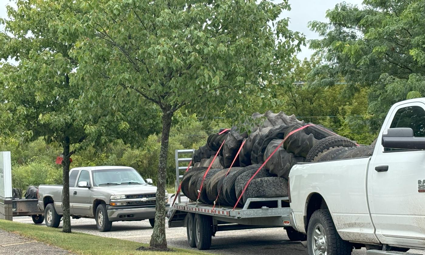 Farmers bring loads of tires to the free agricultural tire recycling event.