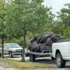 Farmers bring loads of tires to the free agricultural tire recycling event.